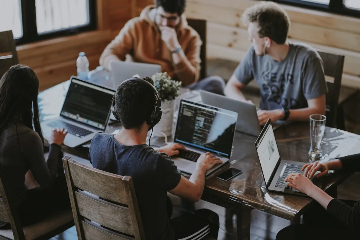 Professional IT team collaborating on technology solutions